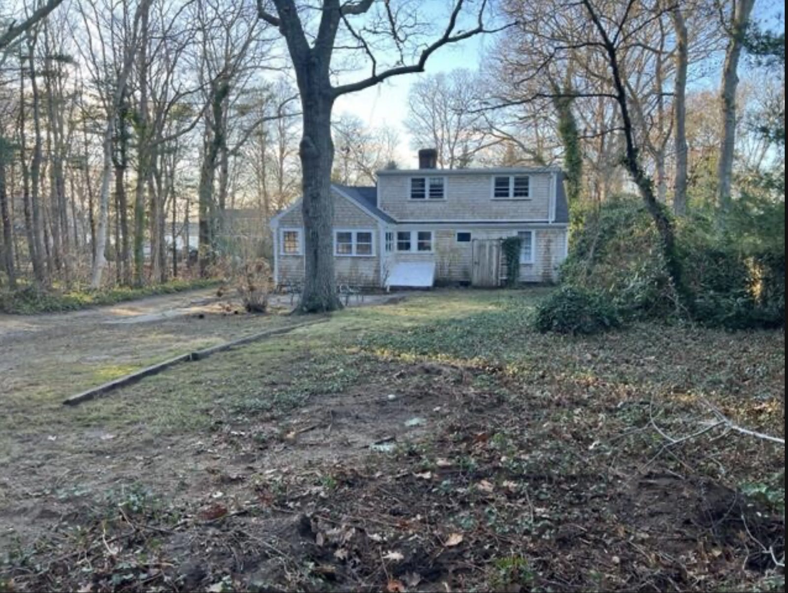 Rear of the Cape Cod cottage before work began
