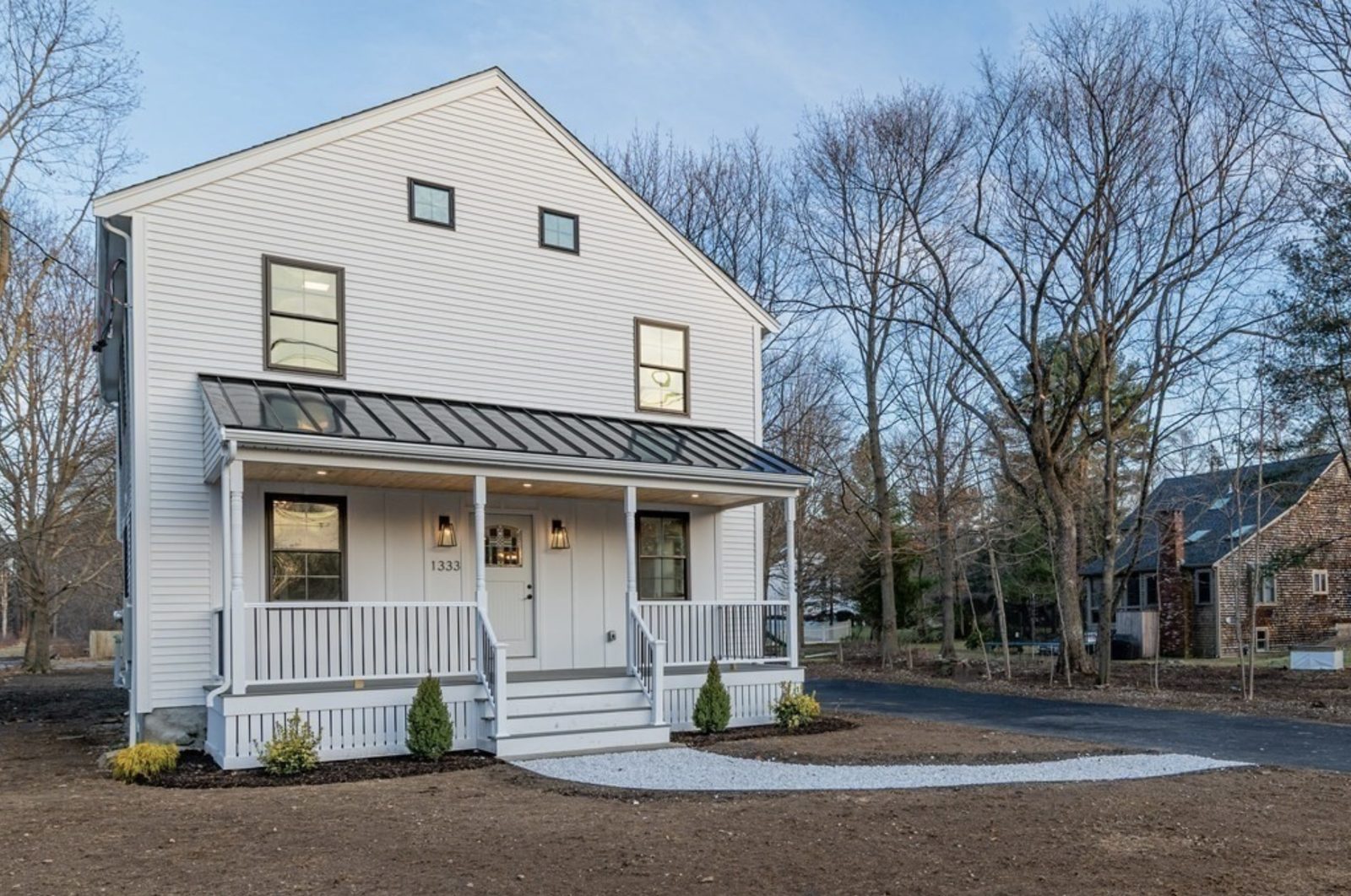 New Construction — Farmhouse with Metal Roof